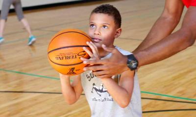 kid playing basketball