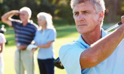 men playing golf