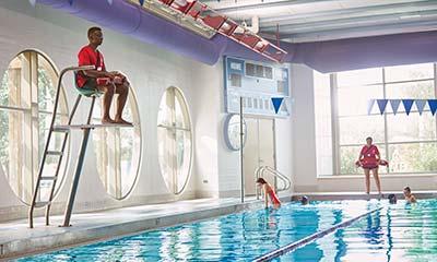 Lifeguards watching over swimmers in the Y's swimming pool