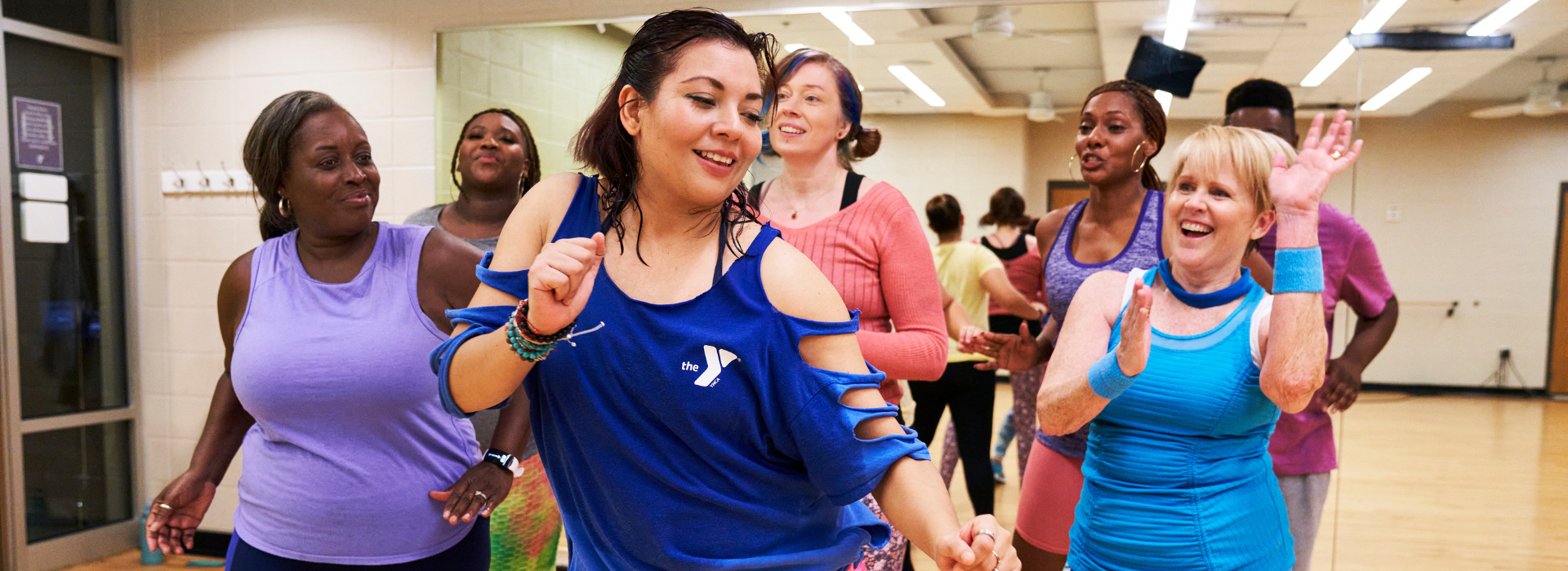 Group exercise class with women working out