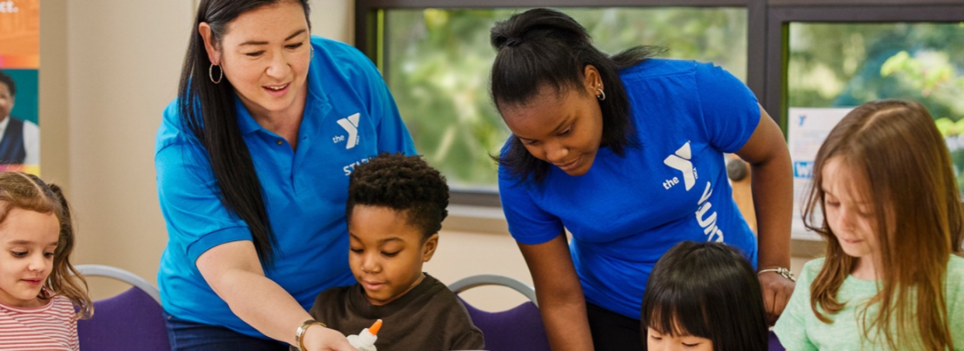 YMCA after school staff with kids